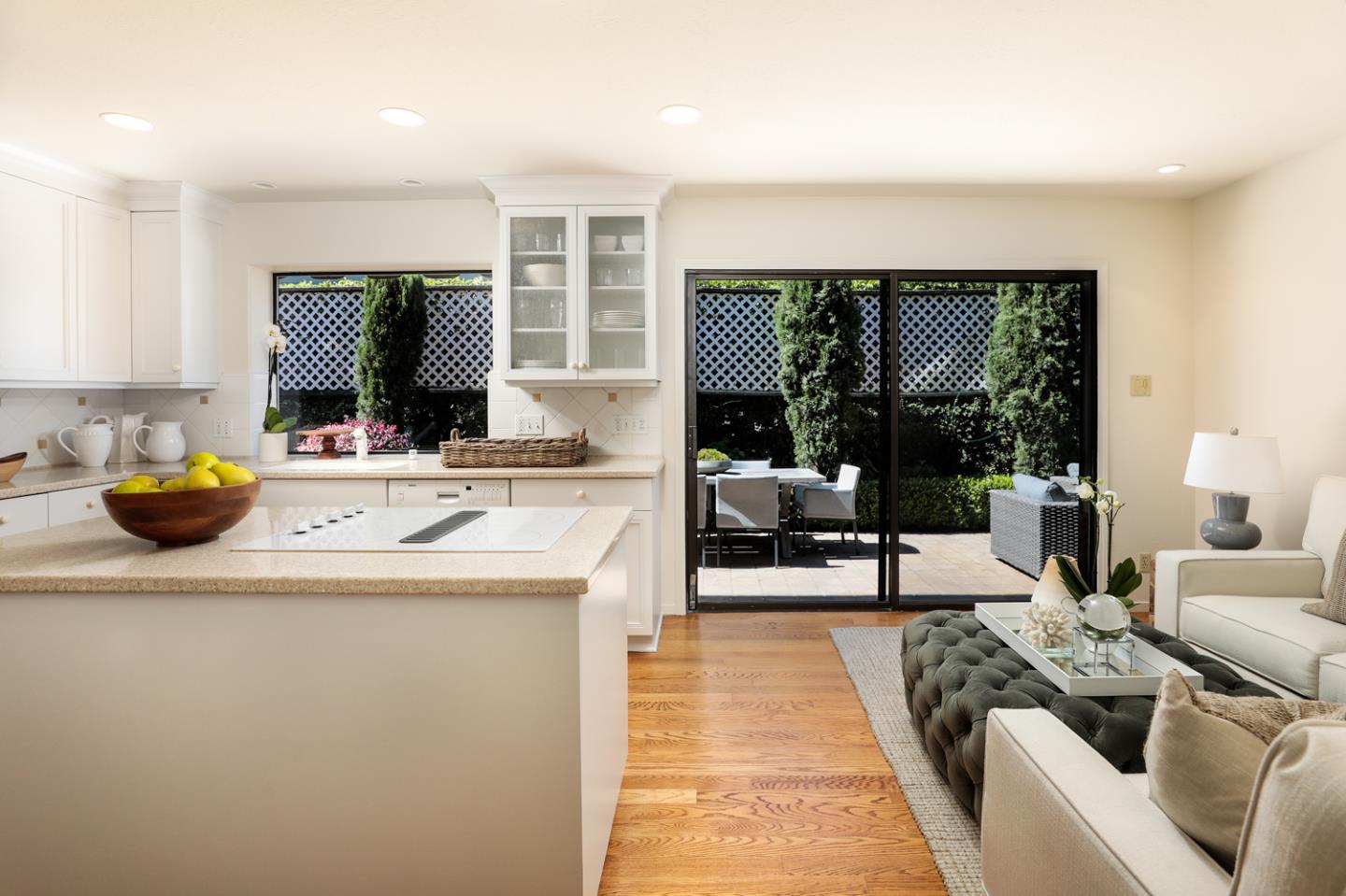 1145 Pine Street Menlo Park, CA 94025 - Photo 5 of 25 a living room with furniture a large window and a flat screen tv