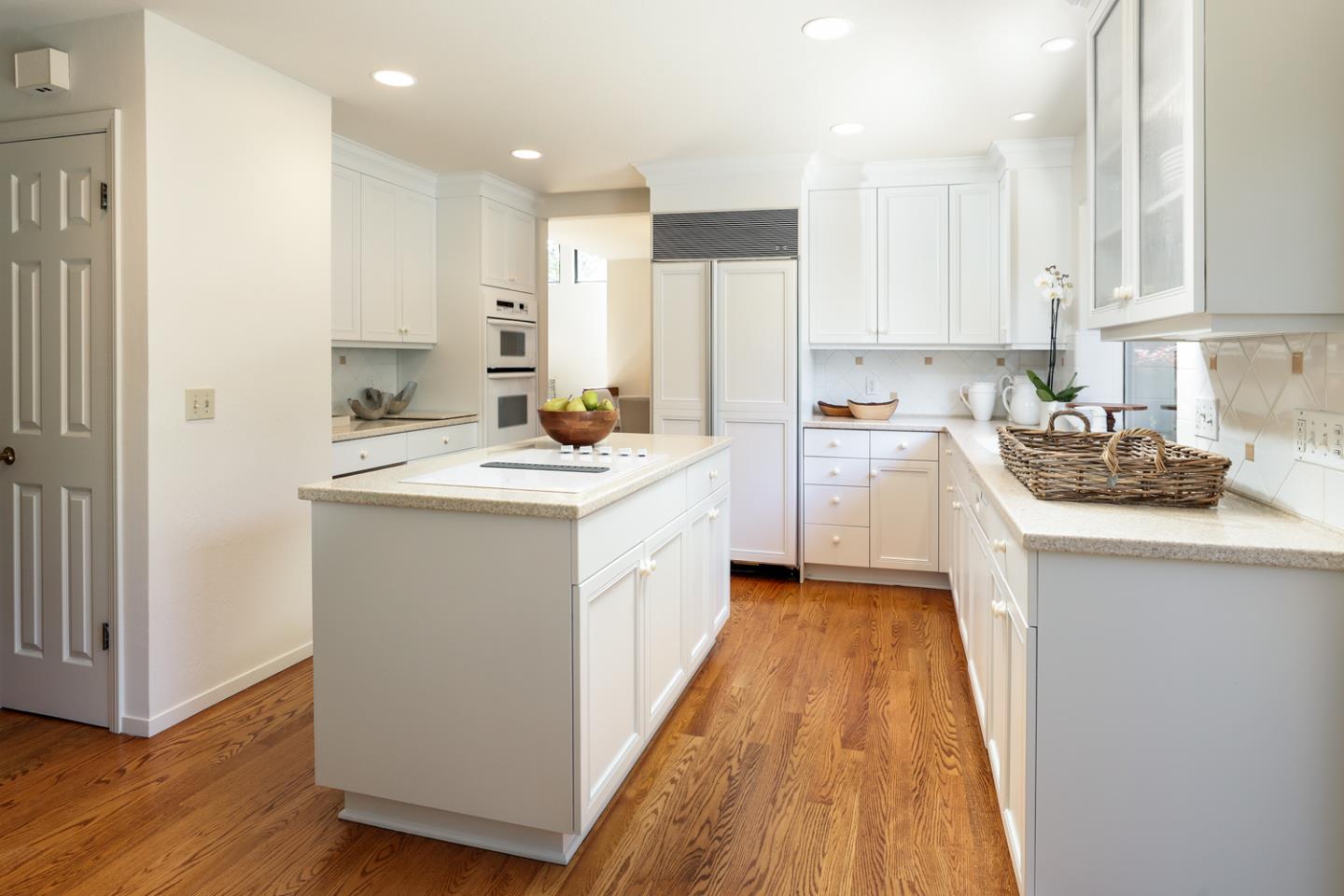 1145 Pine Street Menlo Park, CA 94025 - Photo 6 of 25 a kitchen with a sink a counter top space stainless steel appliances and cabinets