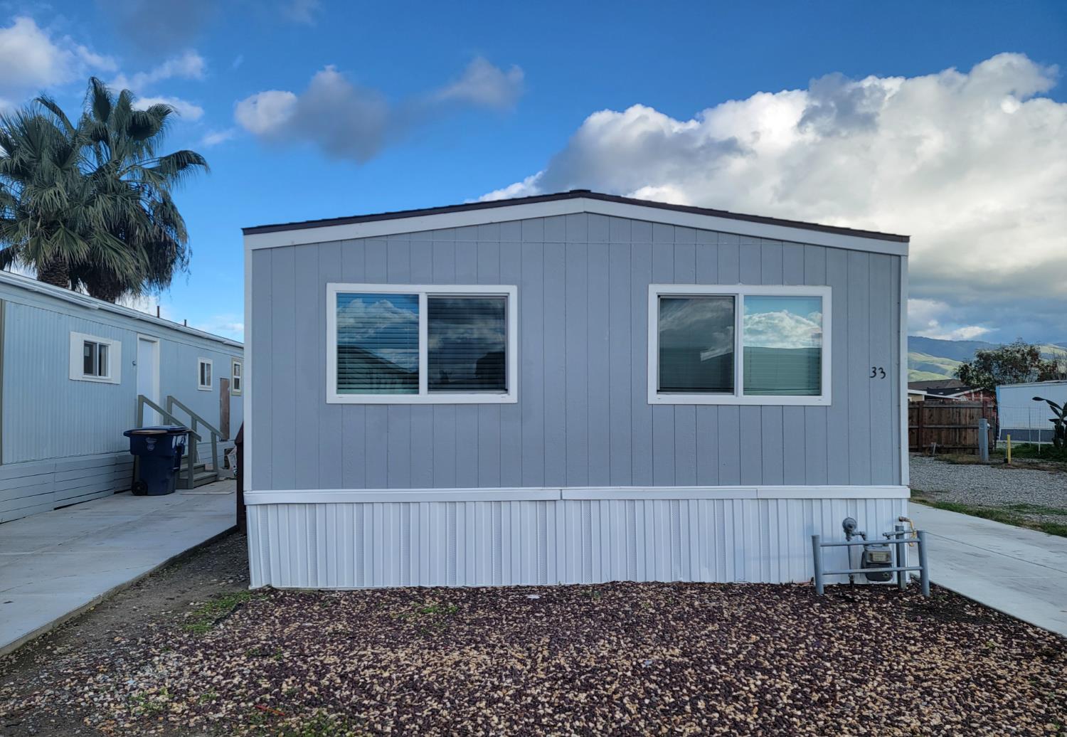 801 Schipper Street, Unit 33 Arvin, CA 93203 - Photo 2 of 2 a view of a house with a balcony