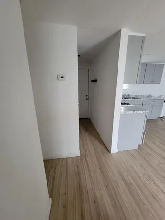 wooden floor with staircase