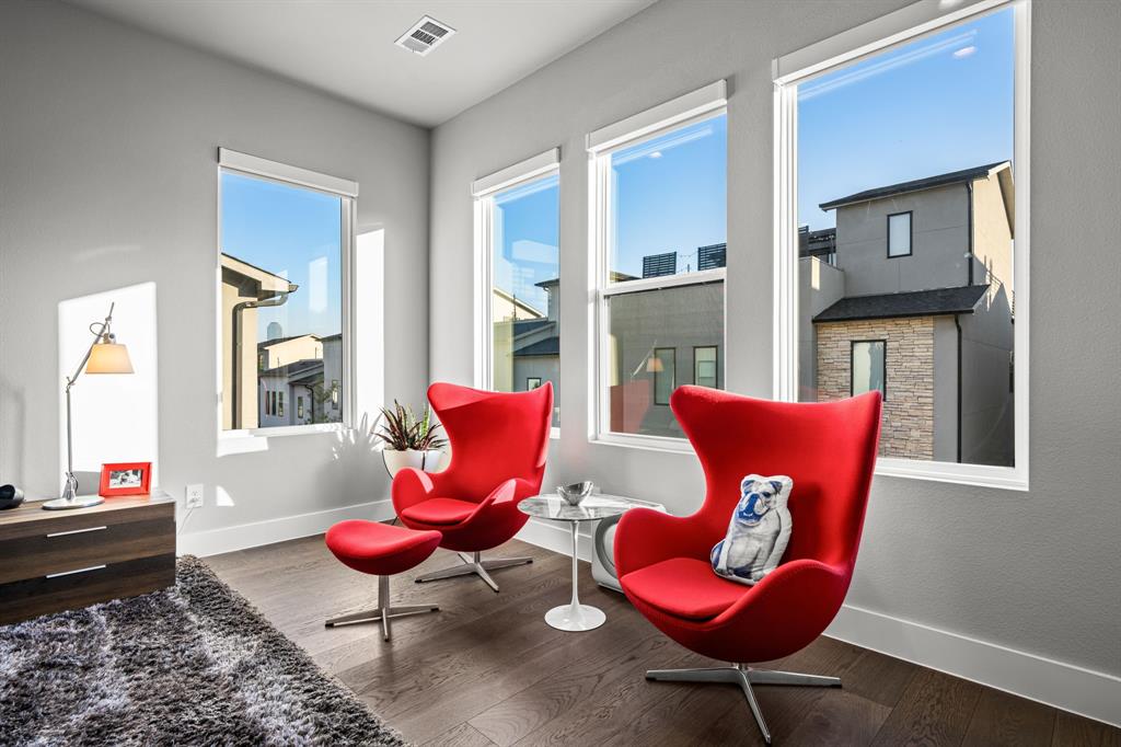 4138 Entrada Way Dallas, TX 75219 - Photo 18 of 40 a living room with furniture or couch and a potted plant