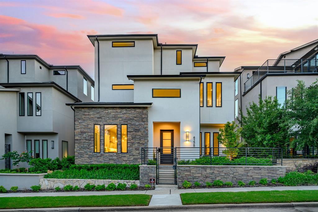 4138 Entrada Way Dallas, TX 75219 - Photo 2 of 40 a front view of a residential apartment building with yard