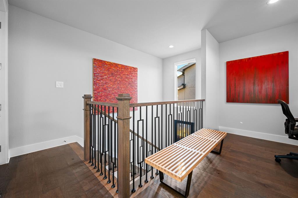 4138 Entrada Way Dallas, TX 75219 - Photo 29 of 40 a bedroom with furniture and a window