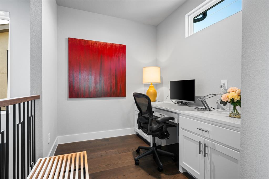 4138 Entrada Way Dallas, TX 75219 - Photo 30 of 40 a view of a workspace with furniture and a window