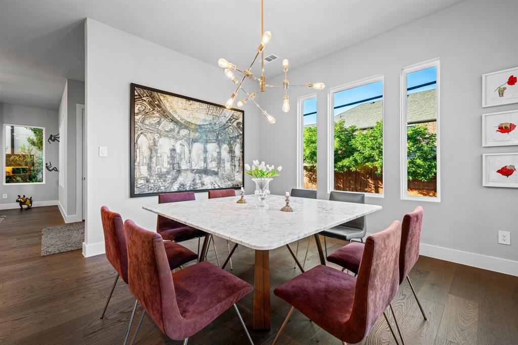 4138 Entrada Way Dallas, TX 75219 - Photo 6 of 40 a view of a dining room with furniture window and outside view