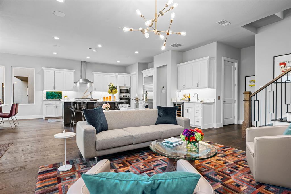 4138 Entrada Way Dallas, TX 75219 - Photo 10 of 40 a living room with furniture and kitchen view