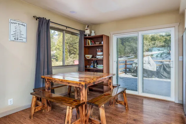 a kitchen with stainless steel appliances a refrigerator sink and cabinets