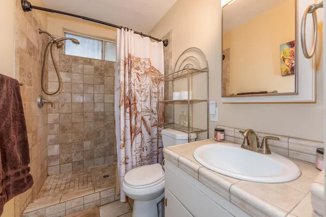 a view of a balcony with wooden floor