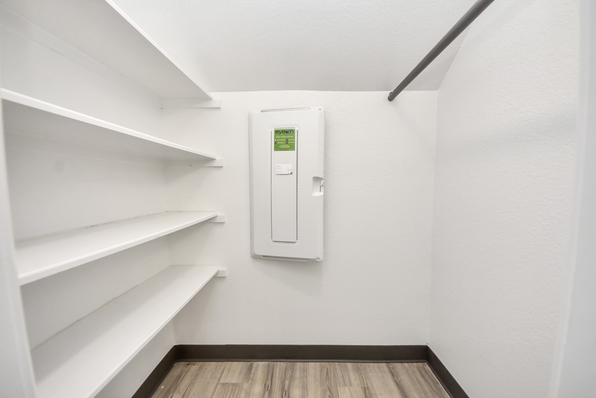 18716 Centro Main Street Conroe, TX 77385 - Photo 11 of 50 Dedicated storage or utility closet with built-in shelving, offering convenient space for supplies, files, or equipment. Clean and well-organized with easy access from the main workspace.