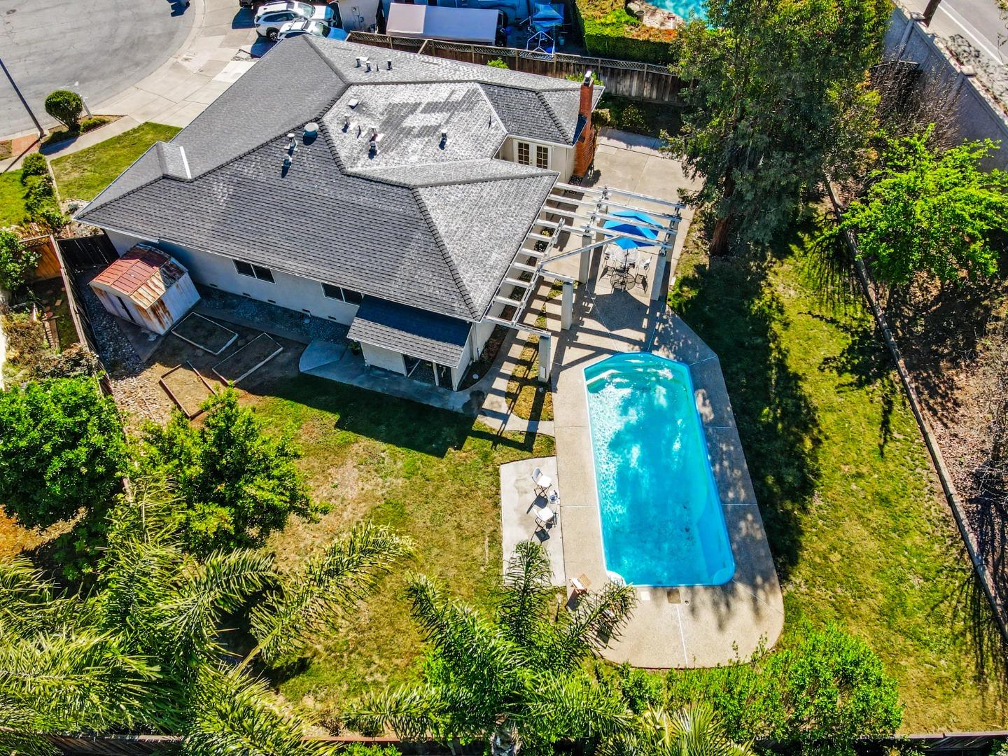 6455 Kensington Place Gilroy, CA 95020 - Photo 31 of 32 an aerial view of a house with garden space and street view