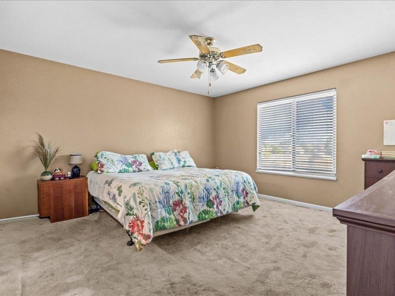 2860 B B 3/4 Road Grand Junction, CO 81503 - Photo 18 of 29 a bedroom with a bed and window