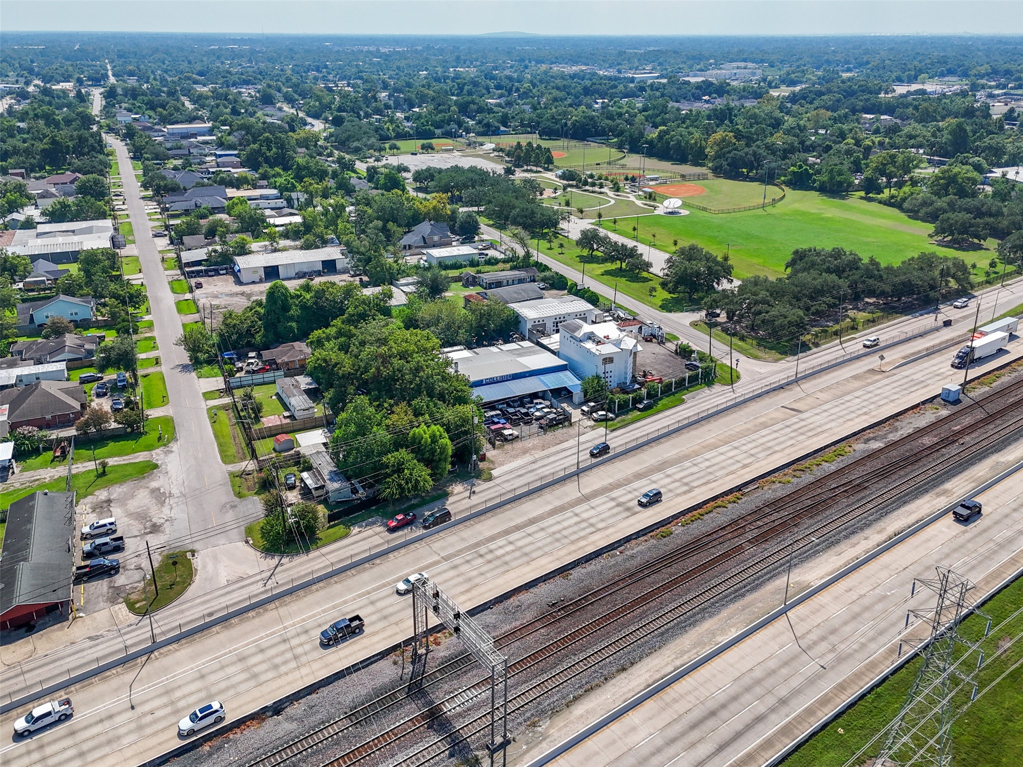 11110 East Hardy Road Houston, TX 77093 - Photo 16 of 18 an aerial view of residential houses with outdoor space