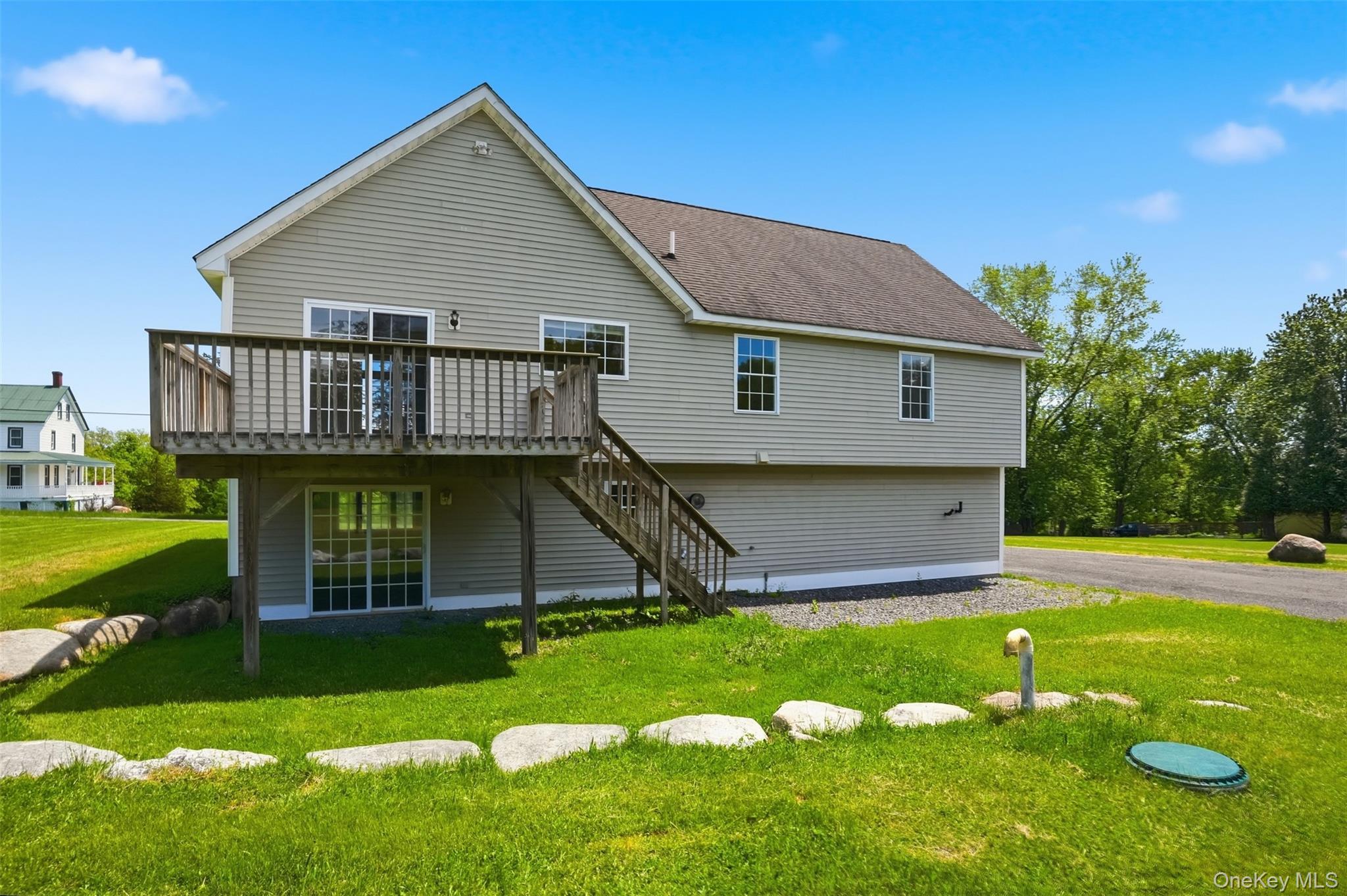 160 Pirog Road Pine Bush, NY 12566 - Photo 41 of 50 a view of a house with a yard and a garden