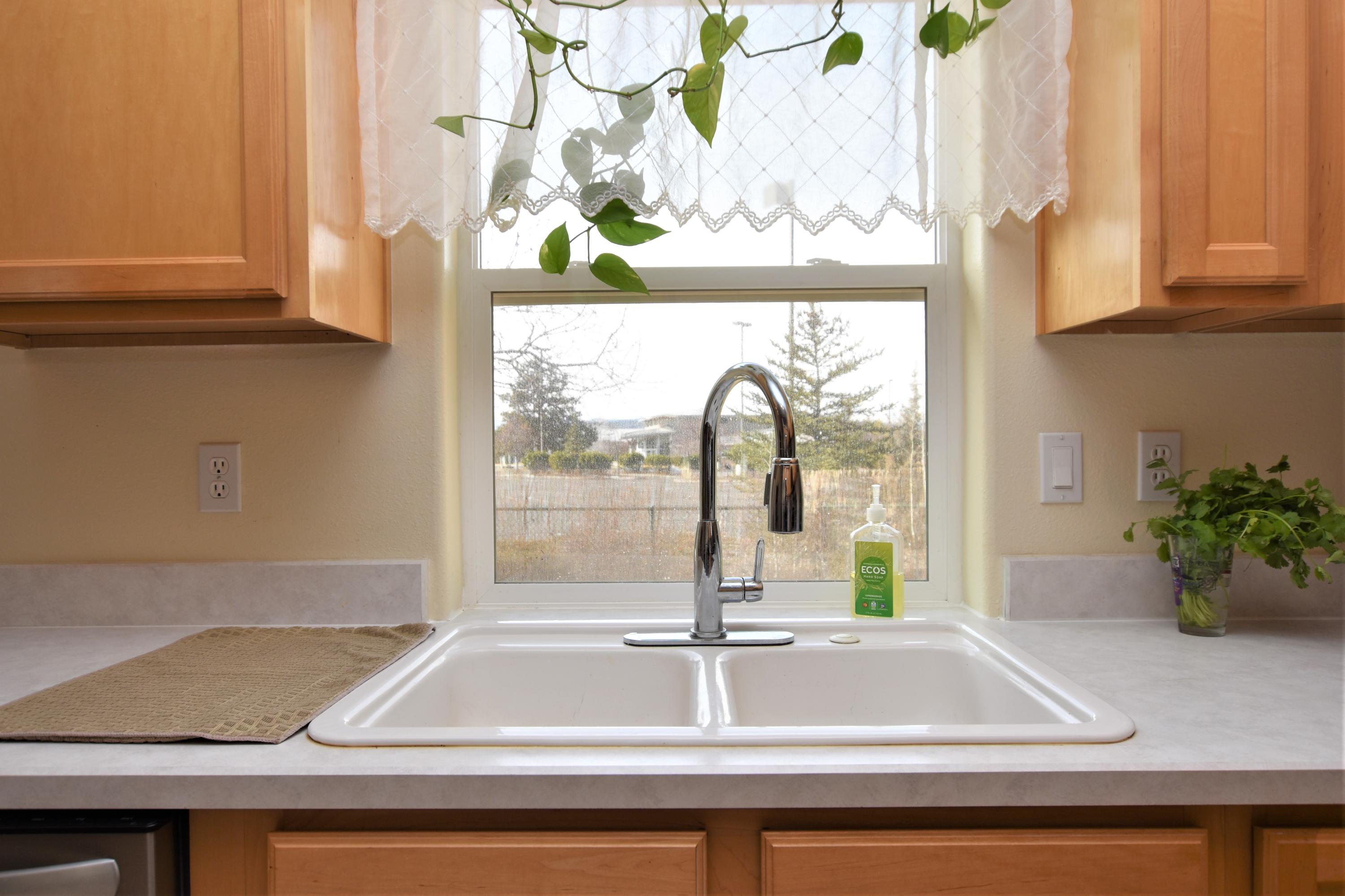 62645 Hawkview Road Bend, OR 97701 - Photo 12 of 22 a sink with a window