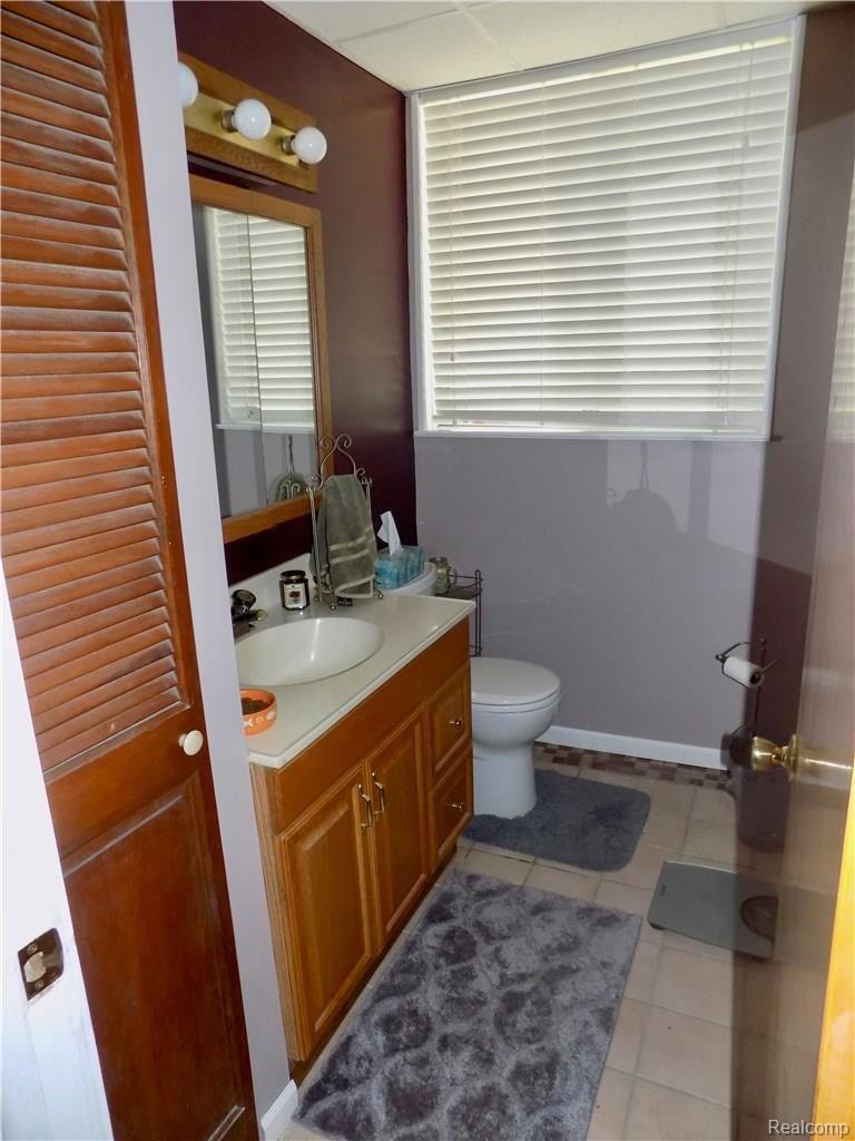 1817 Middle Trail Road Walled Lake, MI 48390 - Photo 17 of 28 LOWER LEVEL POWDER ROOM