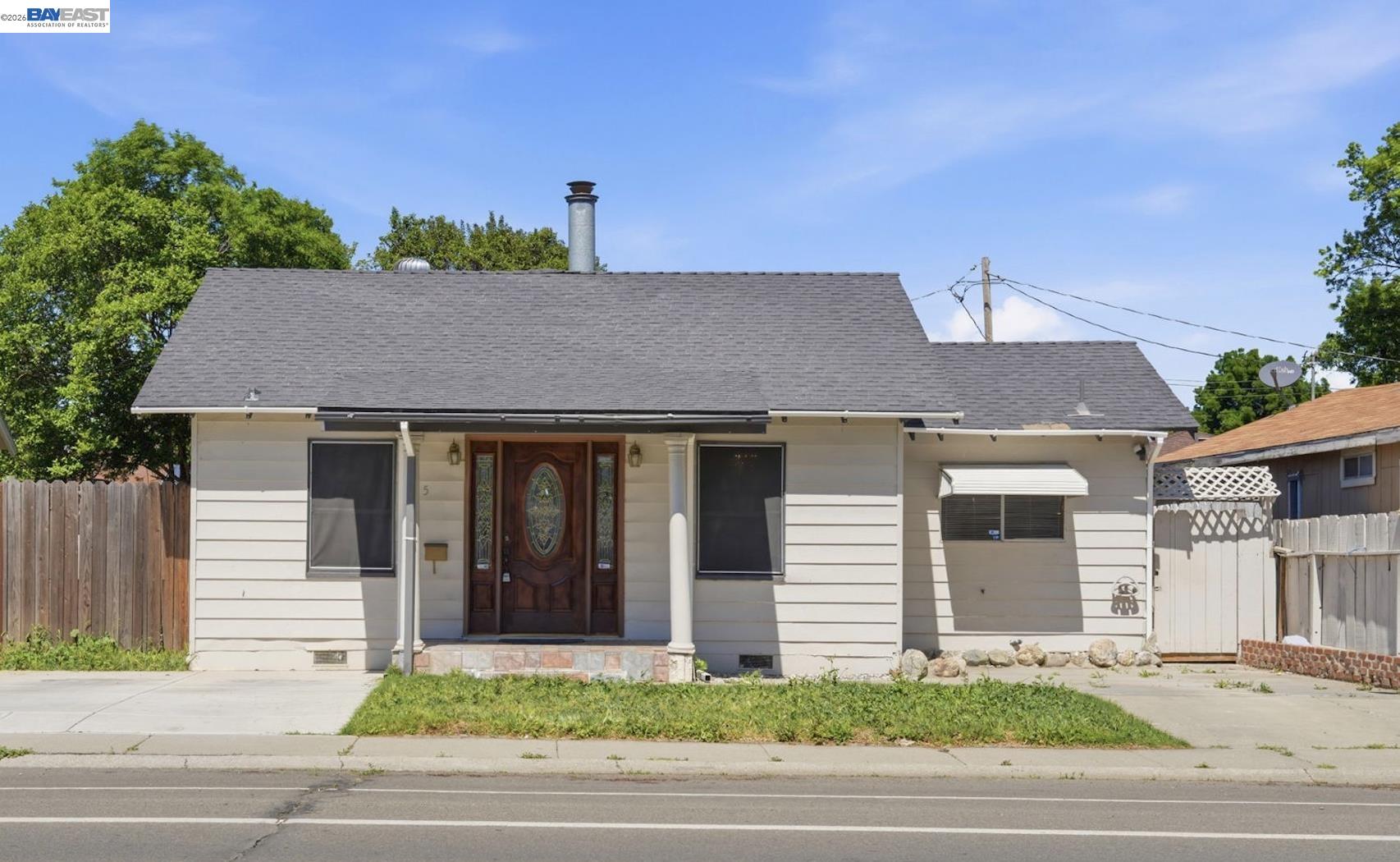 315 M Street Patterson, CA 95363 - Photo 1 of 17 a house that has a lots of windows in it
