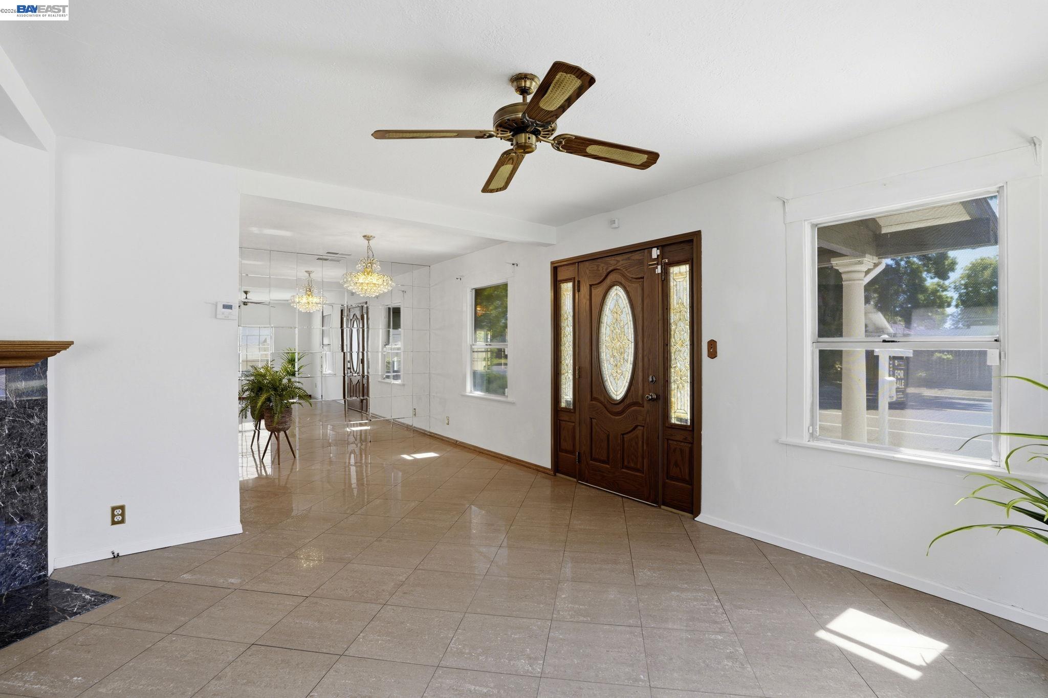 315 M Street Patterson, CA 95363 - Photo 4 of 17 a view of an entryway with wooden floor