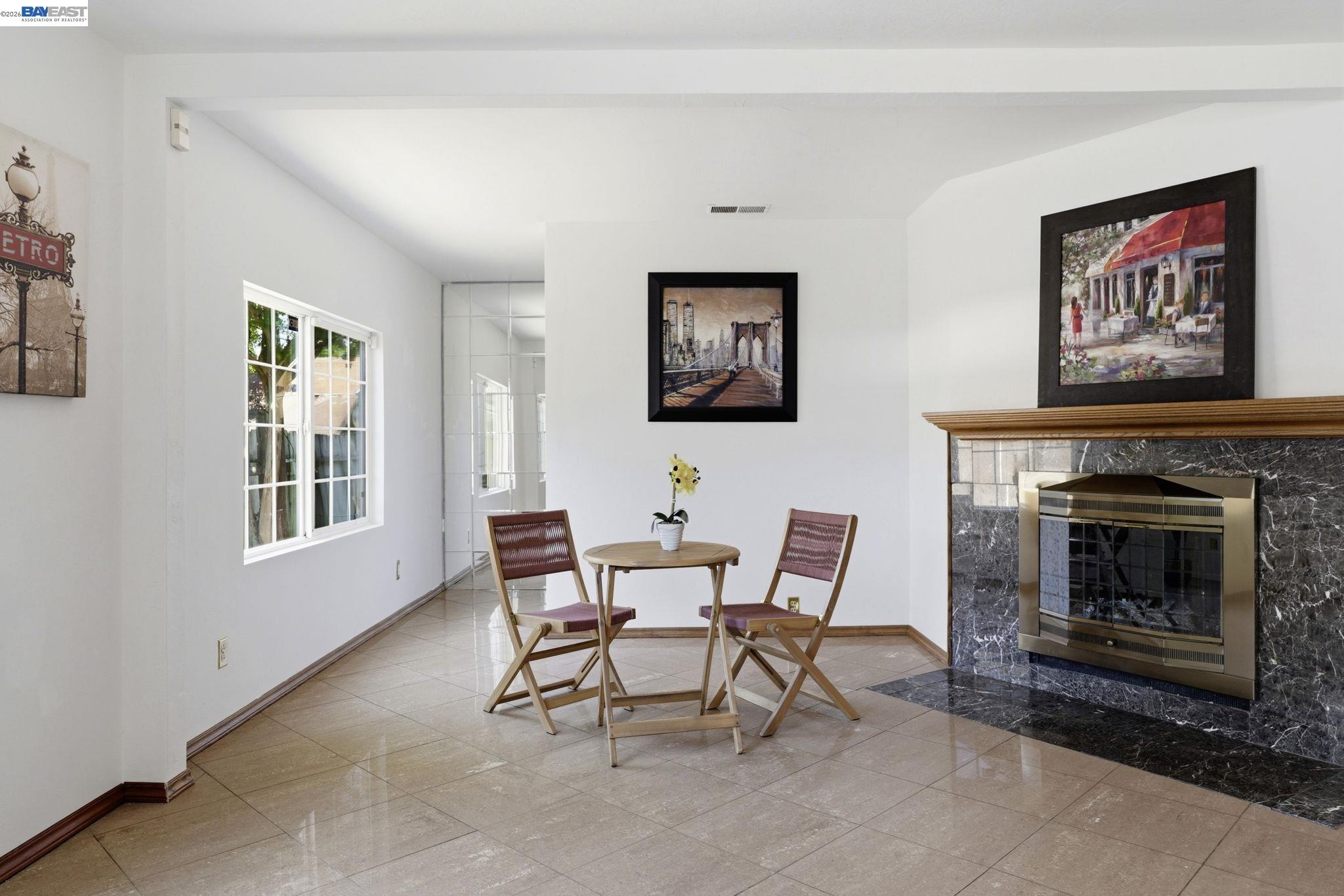 315 M Street Patterson, CA 95363 - Photo 5 of 17 a dining room with furniture and a fireplace