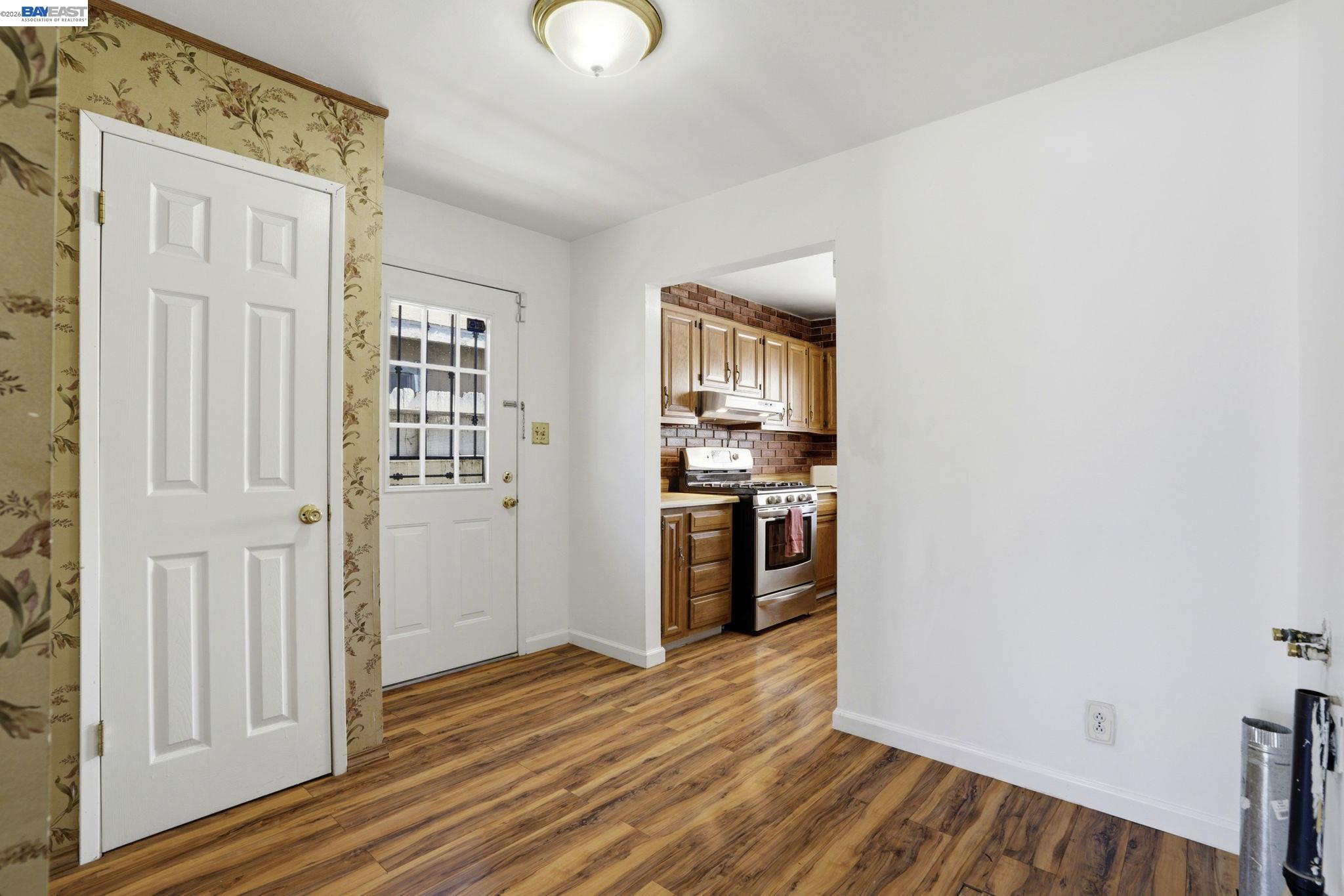 315 M Street Patterson, CA 95363 - Photo 8 of 17 a view of a kitchen from the hallway