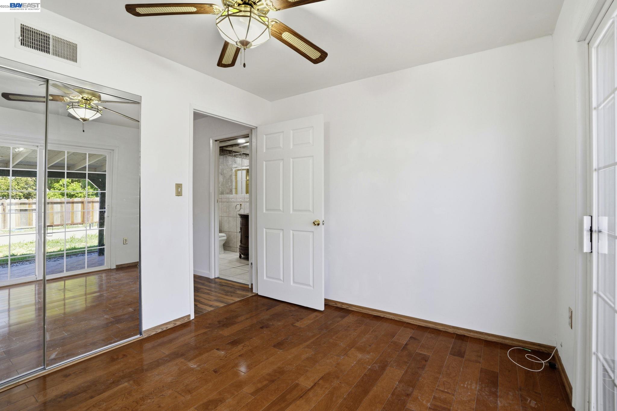 315 M Street Patterson, CA 95363 - Photo 9 of 17 a view of an entryway with wooden floor