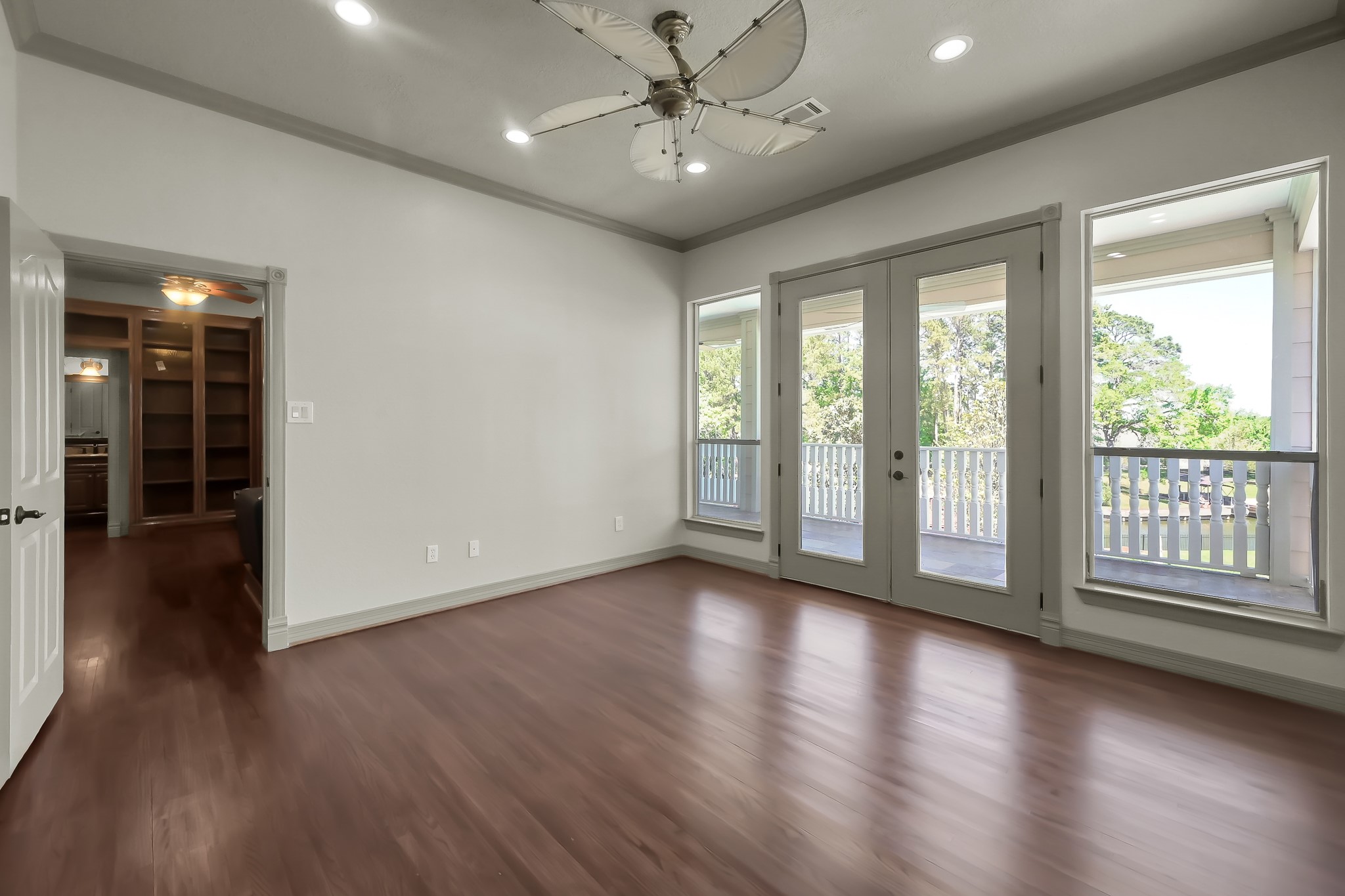 12758 Aries Loop Willis, TX 77318 - Photo 27 of 48 Fifth Bedroom is off the Media Room and has French doors to Balcony