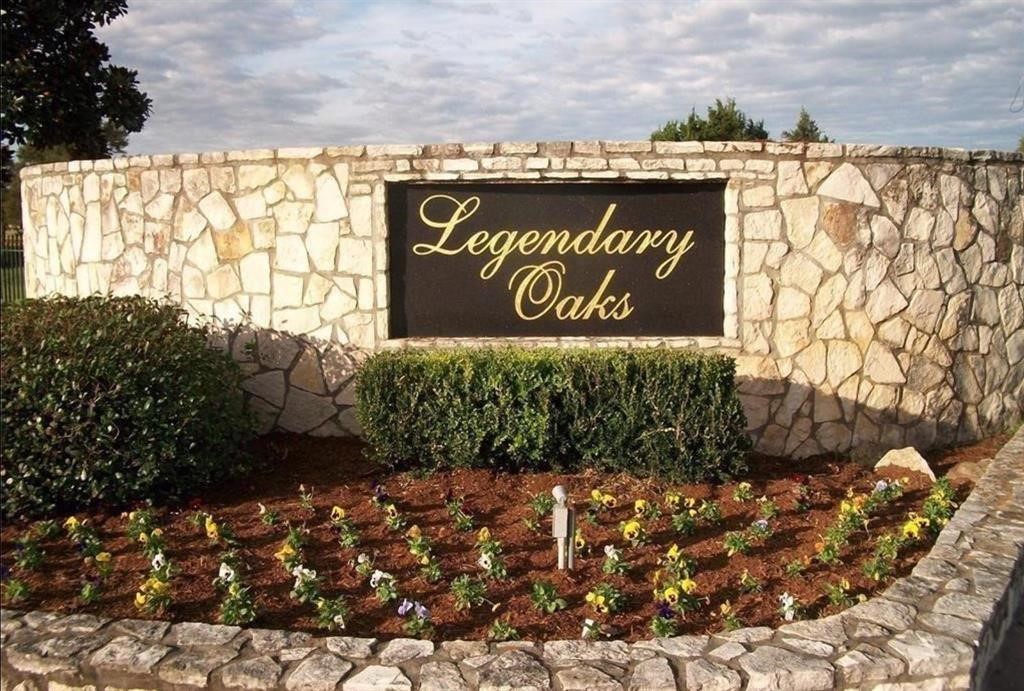 320 Mavanelle Cove Hempstead, TX 77445 - Photo 5 of 13 a view of outdoor space with signage and flags