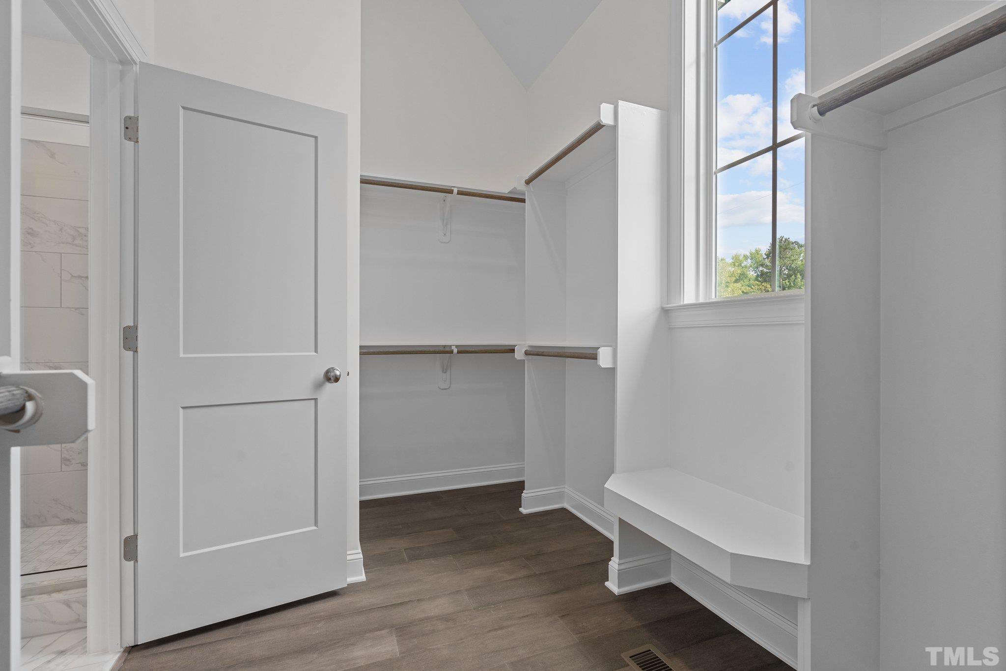 488 Pine Ridge Road Zebulon, NC 27597 - Photo 17 of 47 a view of walk in closet with window