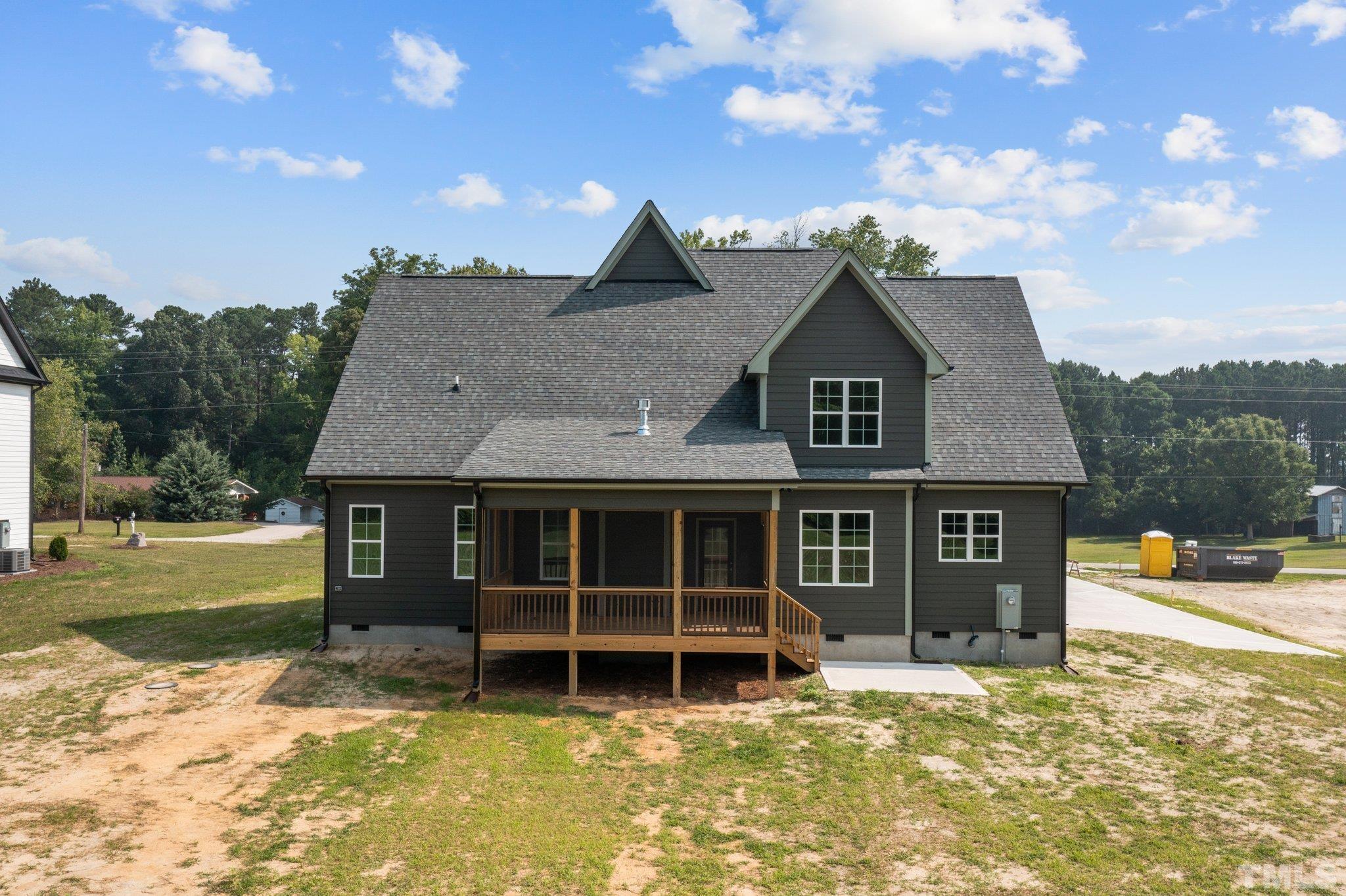 488 Pine Ridge Road Zebulon, NC 27597 - Photo 34 of 47 a house view with a garden space