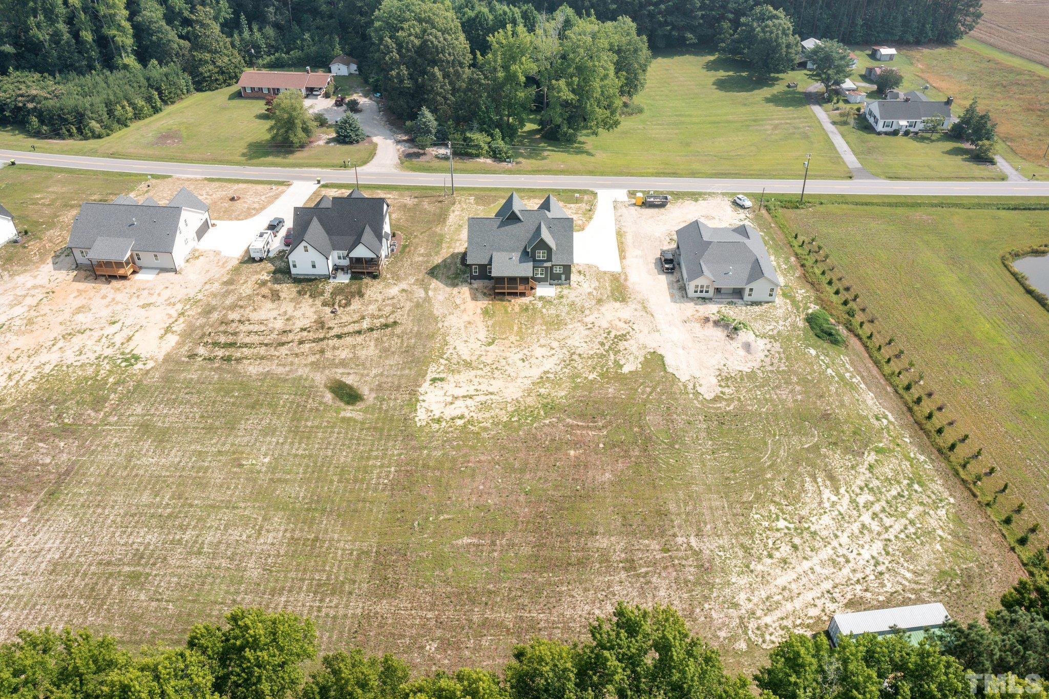 488 Pine Ridge Road Zebulon, NC 27597 - Photo 46 of 47 a view of a swimming pool and outdoor space