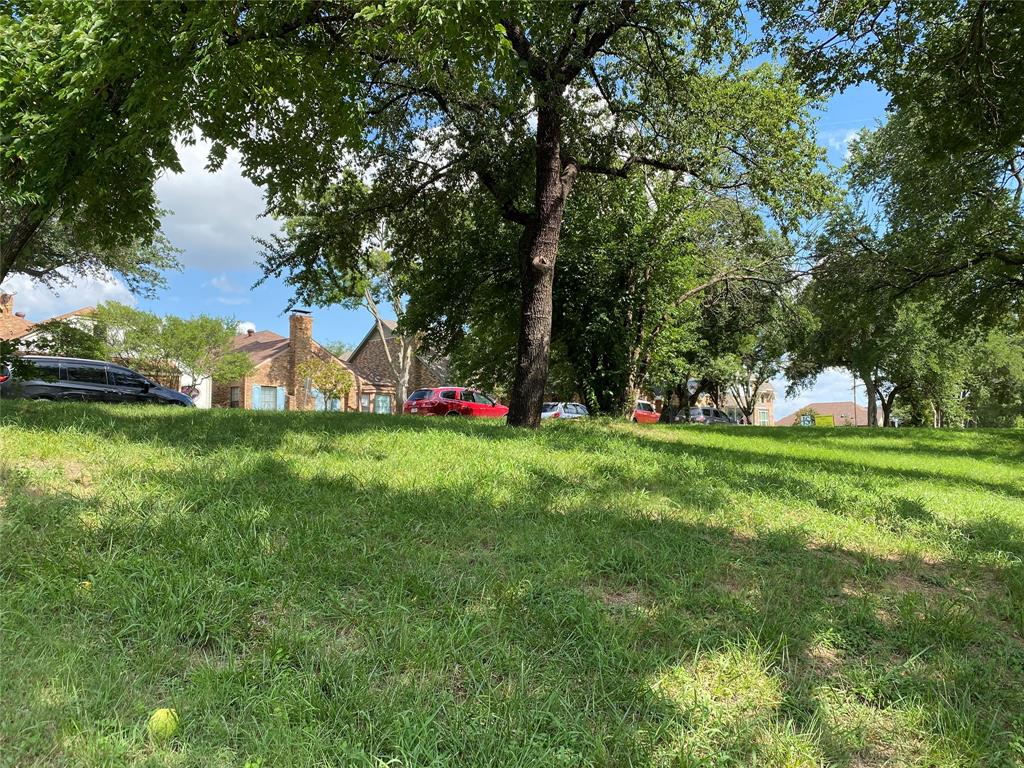 702 South Alamo Road Rockwall, TX 75087 - Photo 3 of 9 a view of green field with trees
