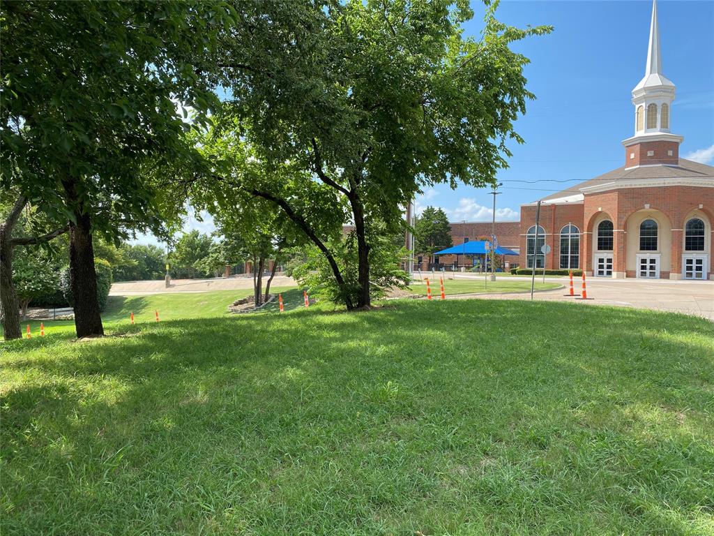702 South Alamo Road Rockwall, TX 75087 - Photo 4 of 9 a view of a house with a yard