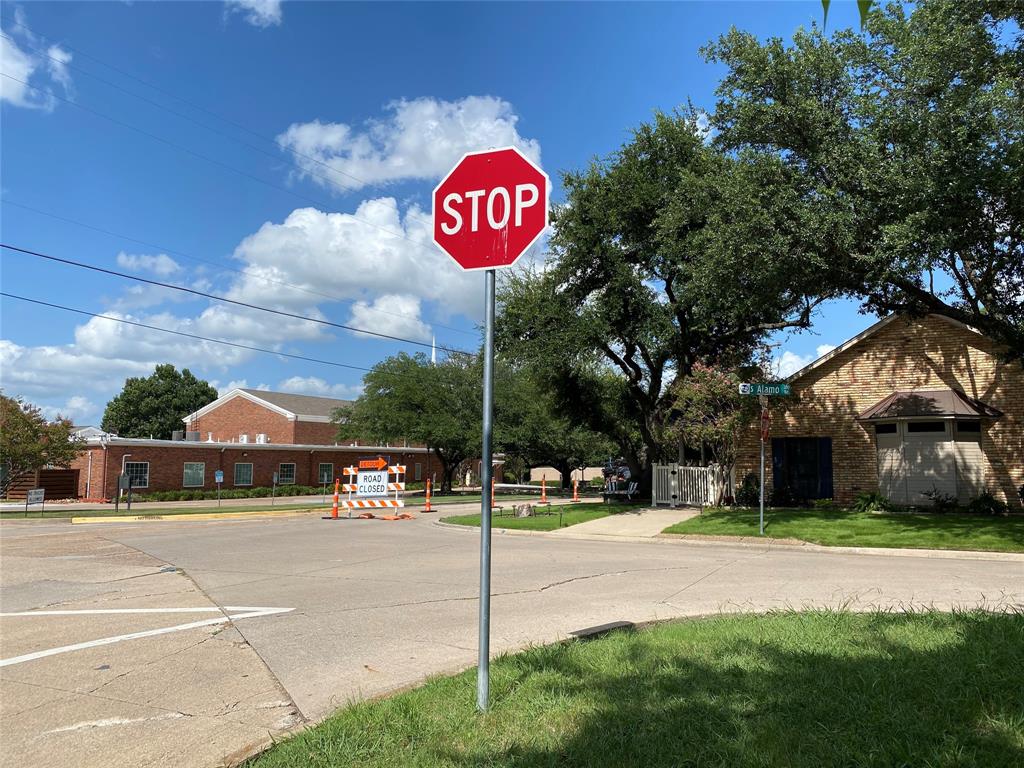 702 South Alamo Road Rockwall, TX 75087 - Photo 7 of 9 a view of street with of parked cars