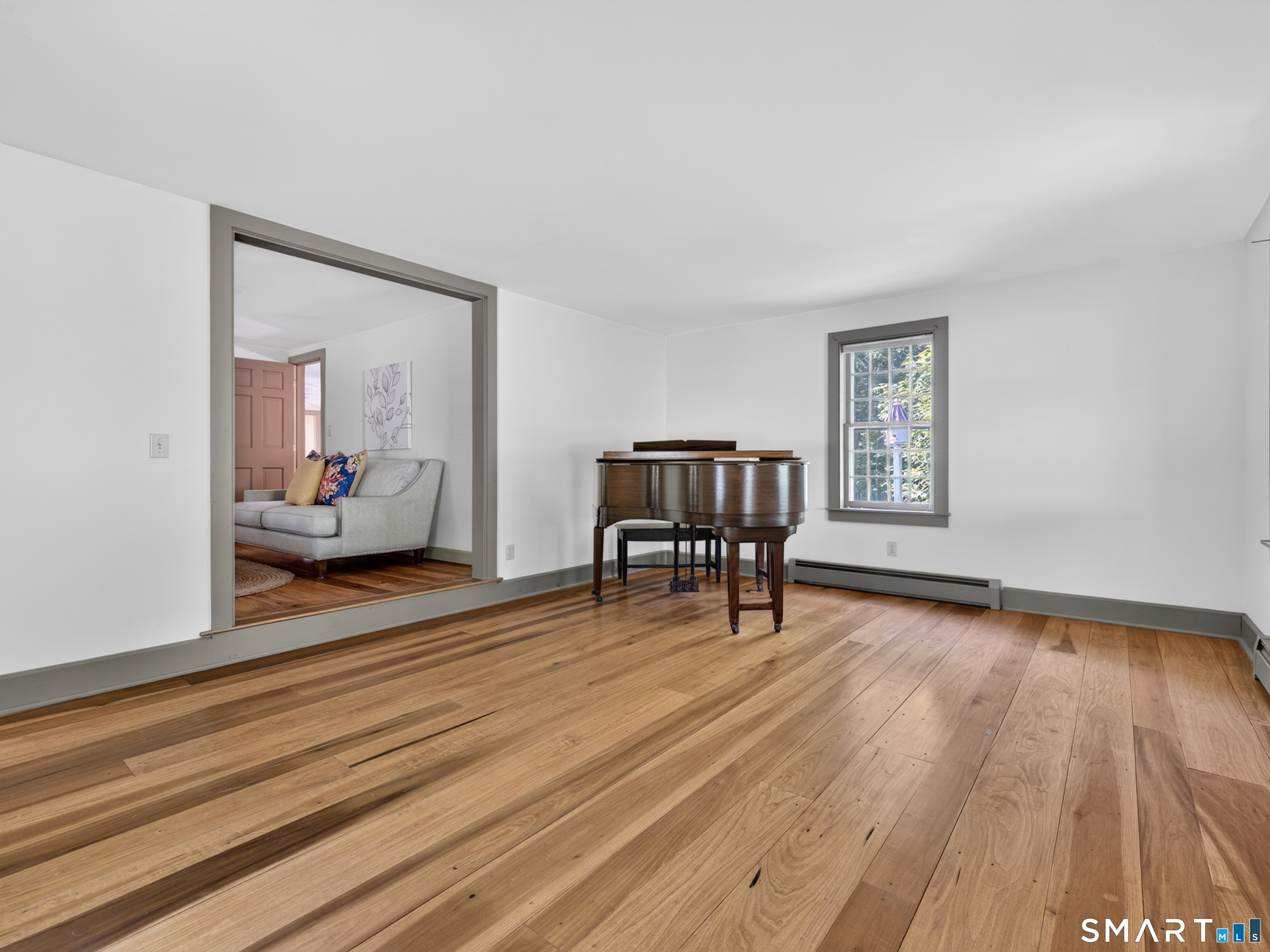 14 Cow Pen Hill Road Killingworth, CT 06419 - Photo 11 of 40 Adjacent to the living room, this flexible room adapts to your lifestyle-perfect for a home office, playroom, study, or hobby space.