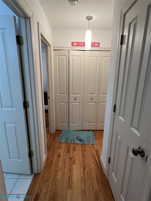 301 Gillim Road Deltaville, VA 23043 - Photo 17 of 31 Hallway featuring light wood-style floors