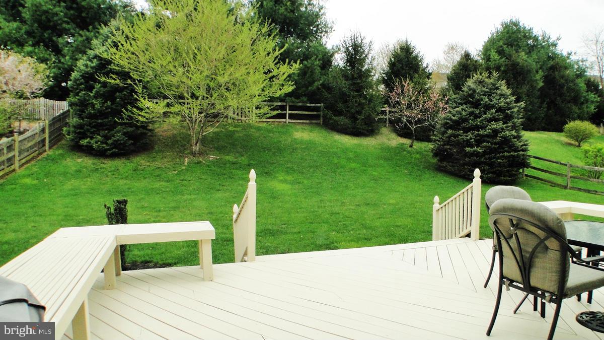 7671 Swallow Road Sykesville, MD 21784 - Photo 28 of 30 a view of a table and chairs in the garden