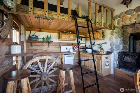 a view of a chairs and table in a patio
