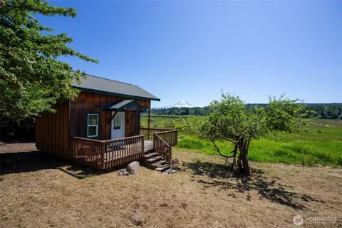 a view of house with outdoor entertaining spaces