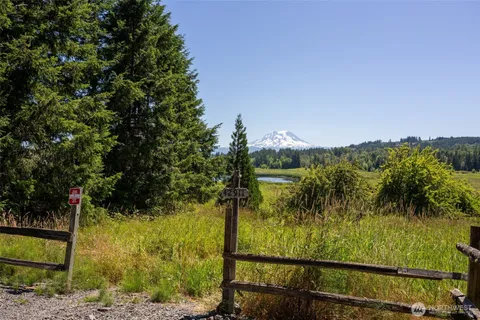 a view of a lake from a balcony