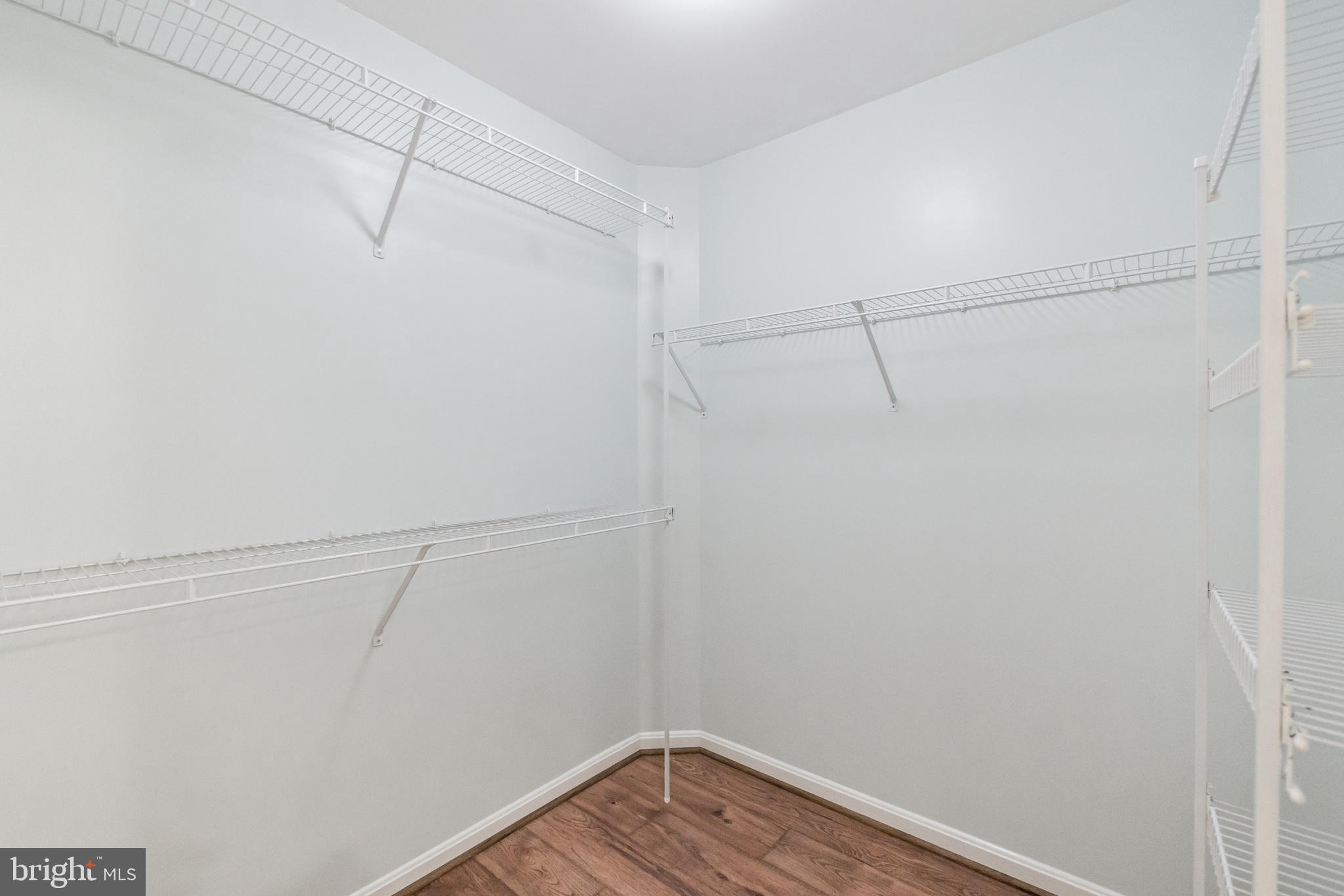 1834 Monocacy View Circle, Unit 53B Frederick, MD 21701 - Photo 19 of 30 a view of a room with racks on the wall