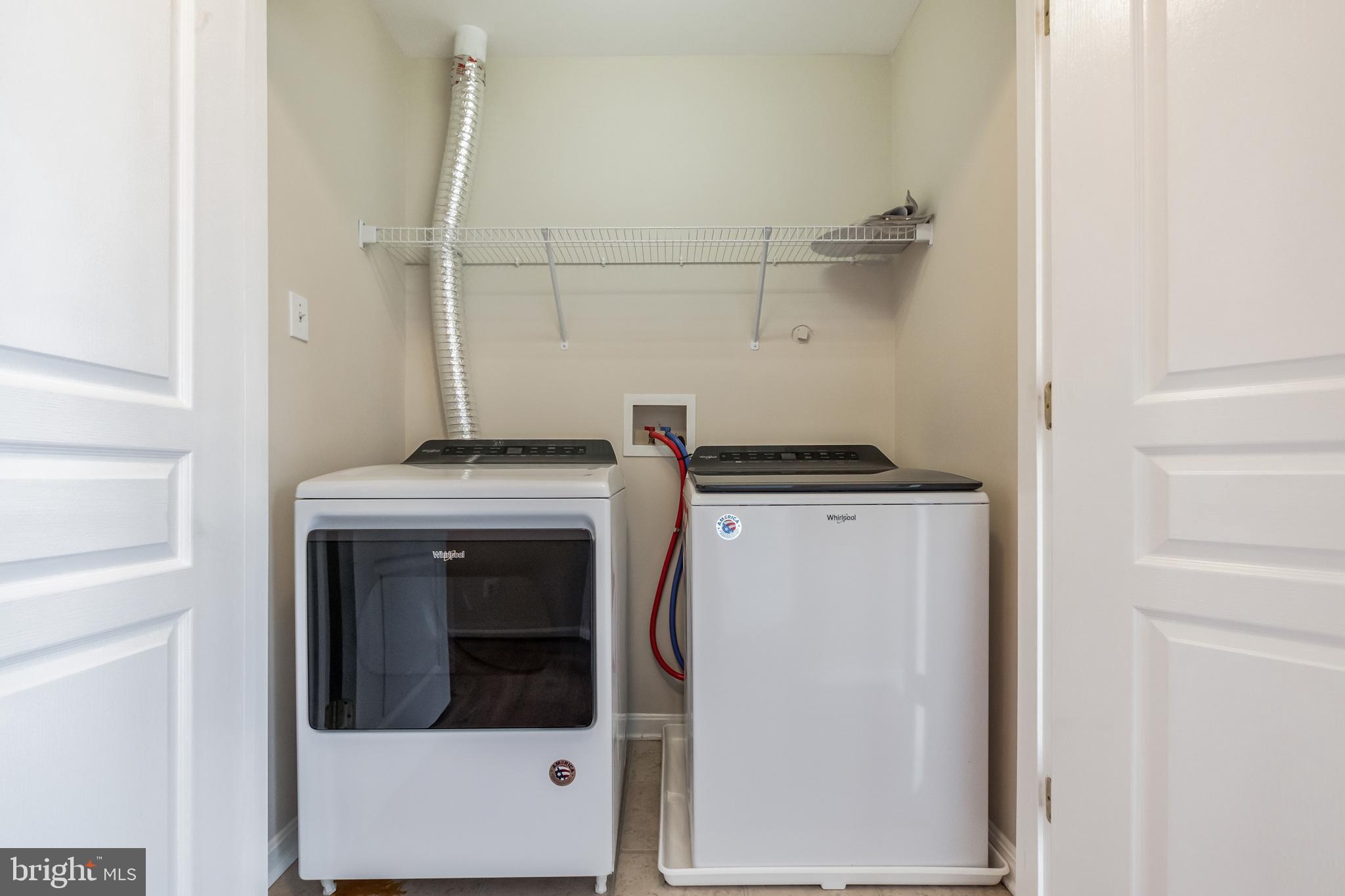 1834 Monocacy View Circle, Unit 53B Frederick, MD 21701 - Photo 20 of 30 a utility room with dryer and washer