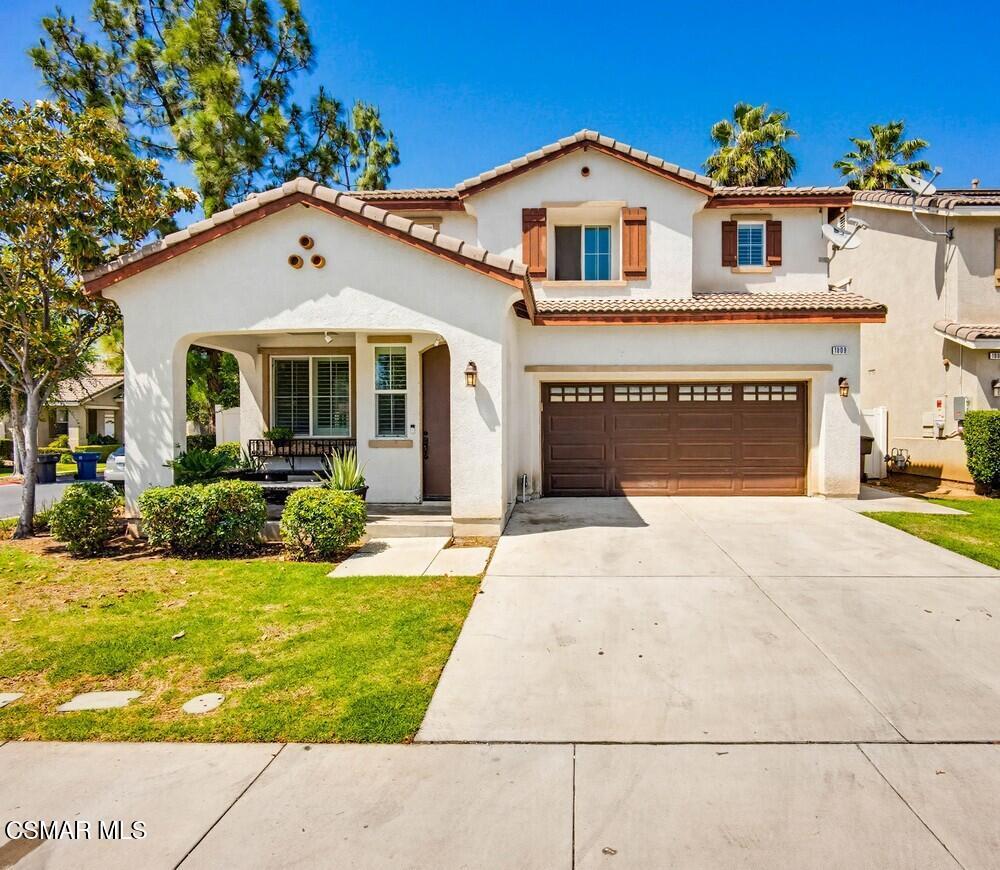 1909 Taormina Court Riverside, CA 92507 - Photo 1 of 58 a front view of a house with a yard