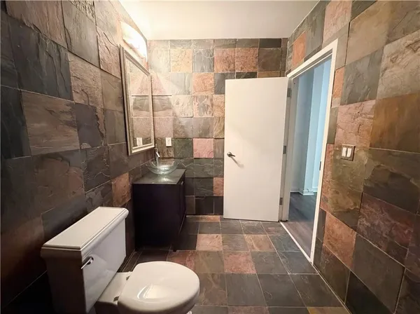 a view of small space with racks on the wall