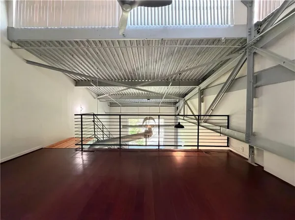 a view of staircase with white walls