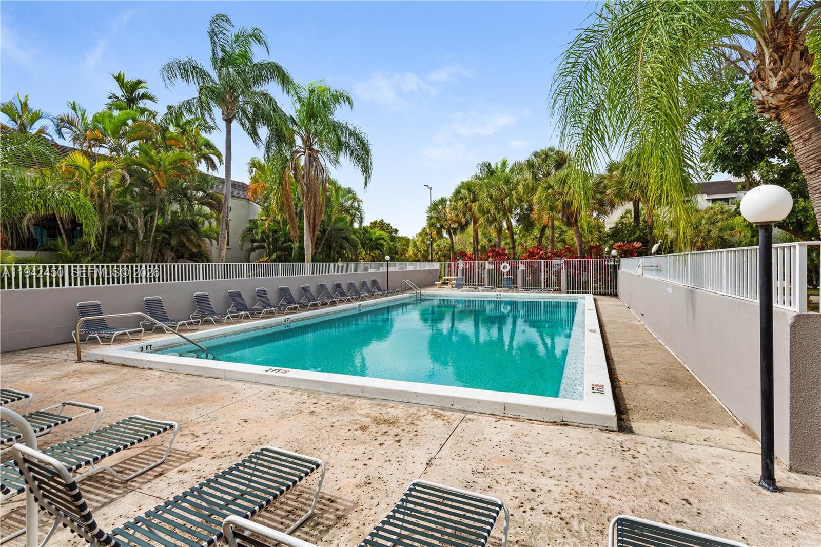 8810 Southwest 132nd Place, Unit 403DN Miami, FL 33186 - Photo 21 of 21 a view of a backyard