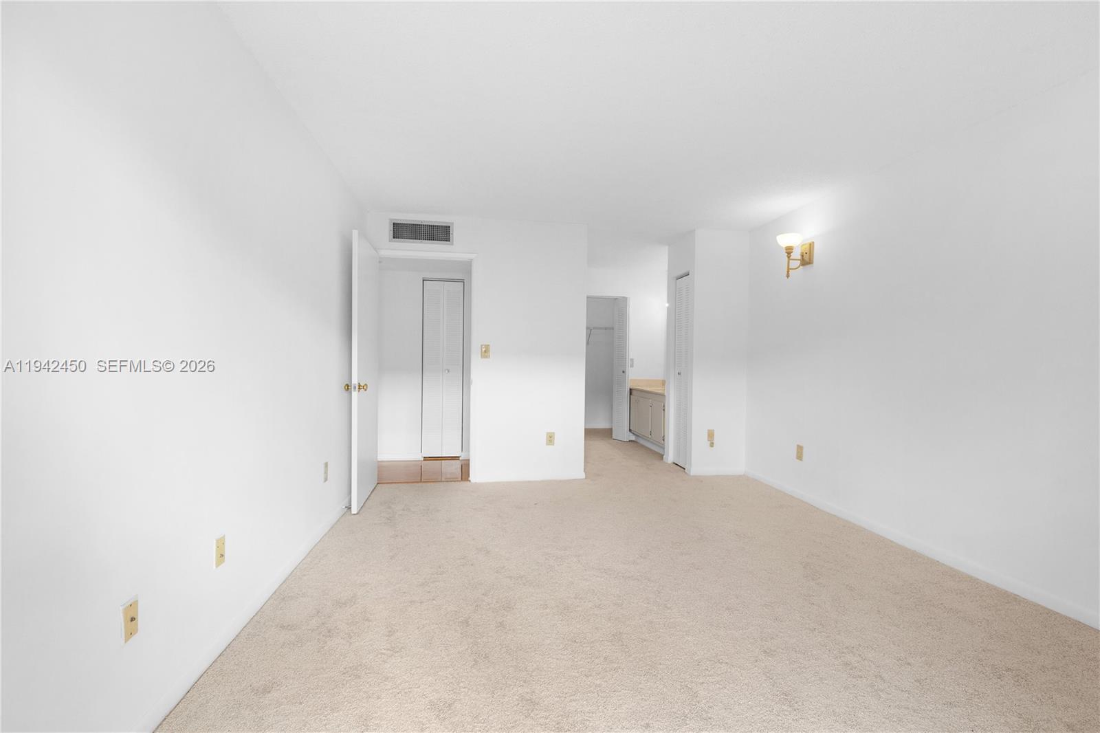 8810 Southwest 132nd Place, Unit 403DN Miami, FL 33186 - Photo 21 of 29 a view of an empty room
