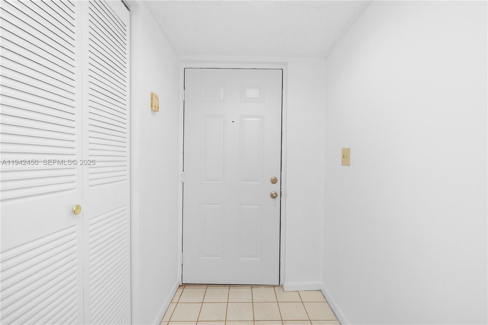 8810 Southwest 132nd Place, Unit 403DN Miami, FL 33186 - Photo 4 of 29 a view of an empty room