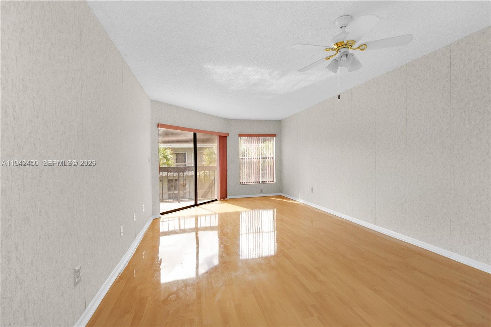 8810 Southwest 132nd Place, Unit 403DN Miami, FL 33186 - Photo 5 of 29 a view of an empty room with a window