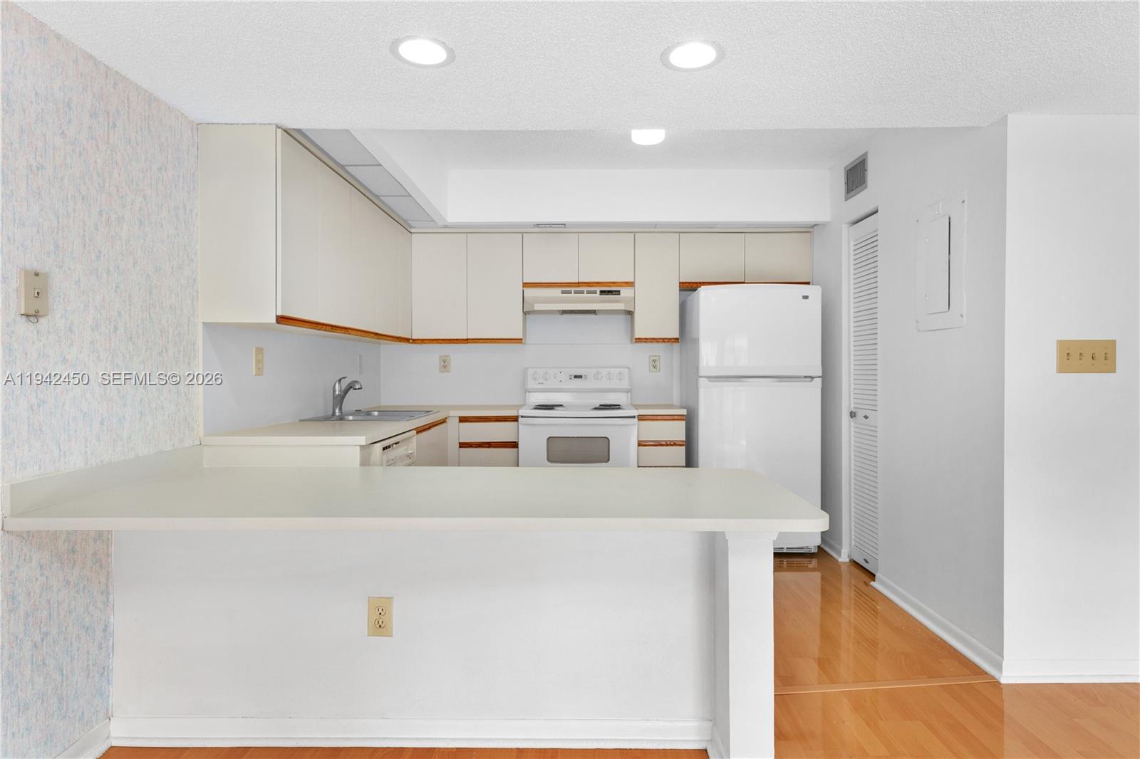 8810 Southwest 132nd Place, Unit 403DN Miami, FL 33186 - Photo 7 of 21 a utility room with washer and dryer
