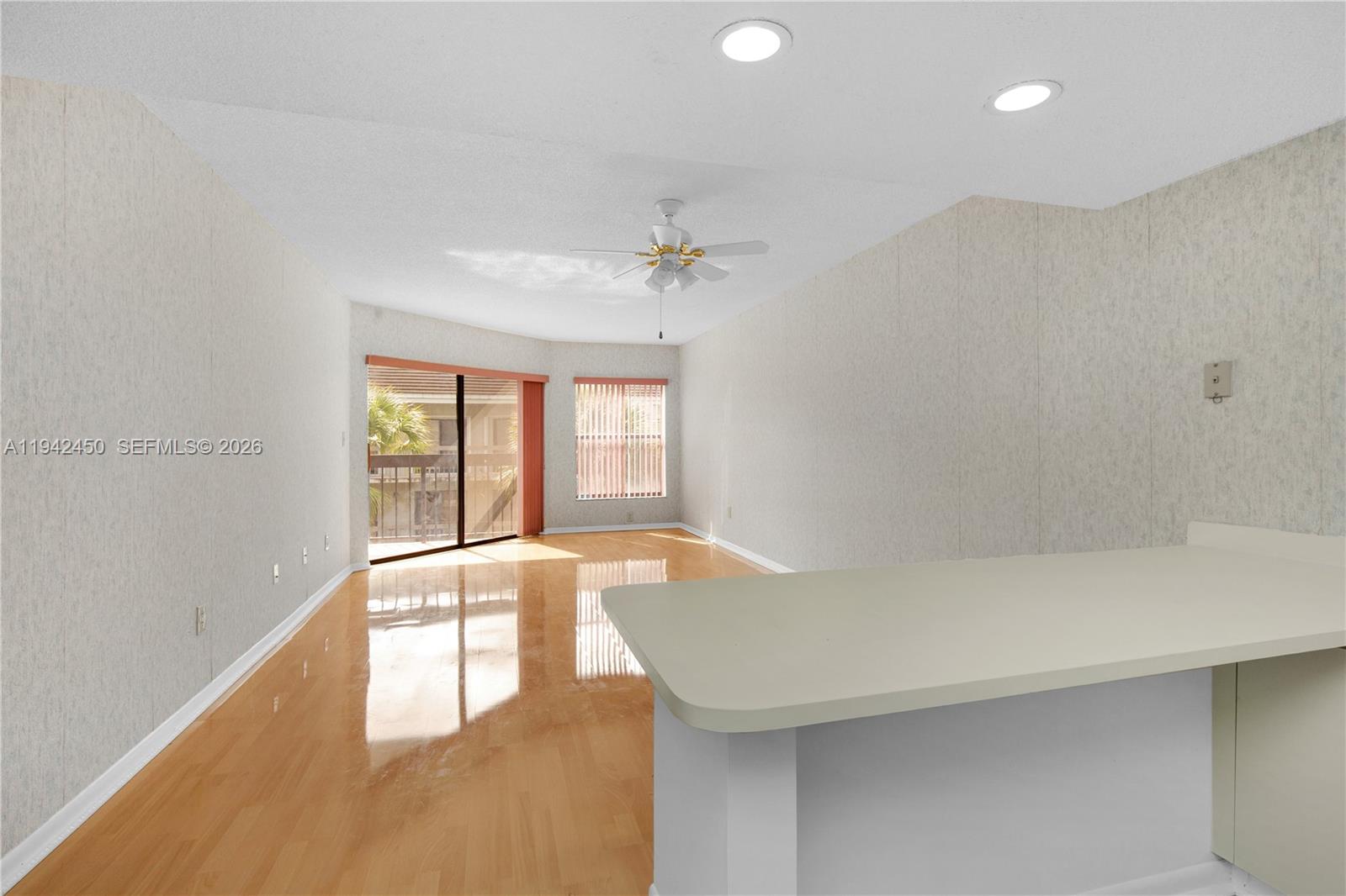 8810 Southwest 132nd Place, Unit 403DN Miami, FL 33186 - Photo 7 of 29 a view of an empty room with a window