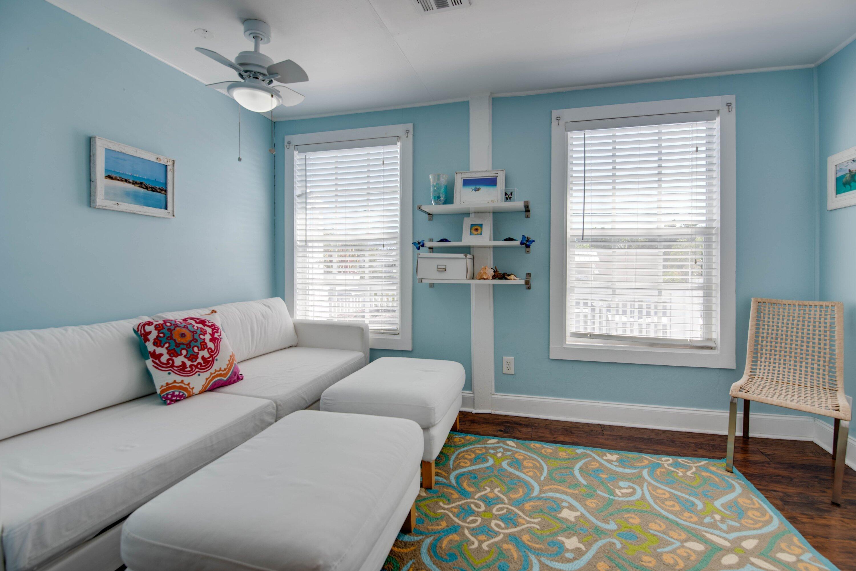 828 White Street, Unit 1 Key West, FL 33040 - Photo 25 of 43 a living room with furniture and a rug